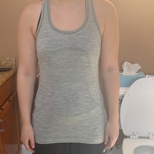 Light olive green lulu lemon workout tank top, super comfy and flattering size 8